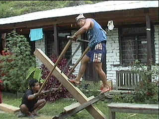 Two man sawmill in operation
