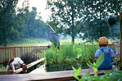 Artisans of the Valley feature Chainsaw Carving by Bob Eigenrauch - Fishing Boy Scene Back View