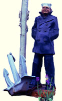 Artisans of the Valley feature Chainsaw Carving by Bob Eigenrauch - Mariner Standing by Flagpole & Anchore