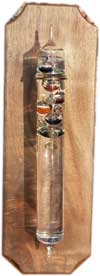 Wooden plaque with floating thermometer 
